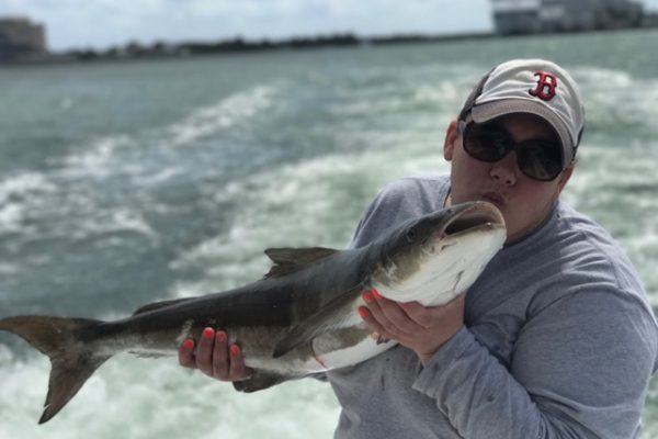 Nice cobia caught by this fisher gal on a sportfishing charter with Fishing Headquarters