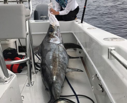 Sarah with a nice swordfish caught with New Lattitude Swordfishing