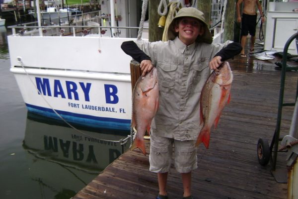 This young angler caught 2 big mutton snappers- Nice fish kid!